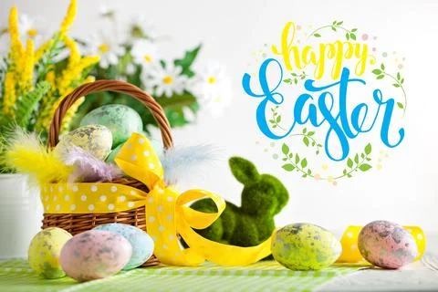 Happy Easter. Congratulatory easter background. Easter eggs and flowers Stock Photos