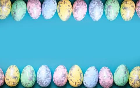 Happy Easter. Congratulatory easter background. Easter eggs and flowers Stock Photos