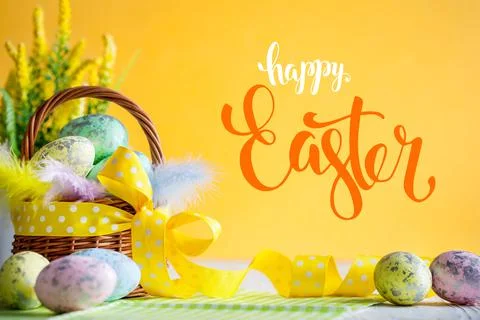 Happy Easter. Congratulatory easter background. Easter eggs and flowers Stock Photos