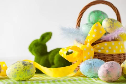 Happy Easter. Congratulatory easter background. Easter eggs and flowers Stock Photos
