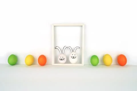 Happy Easter. Creative card from colorful eggs in row and two funny rabbits i Stock Illustration
