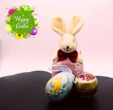 Happy Easter! Cute rabbit bunny with colorful eggs Stock-Fotos