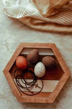 Happy Easter Day With Brown Eggs On The Beige Background Stock Photos