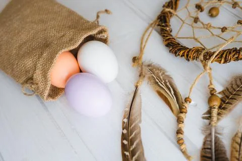 Happy Easter day. A canvas bag with Easter painted eggs. Stock Photos