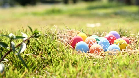 Happy Easter Day. Easter eggs on green grass background, Dolly shot. Stock Footage 148988927