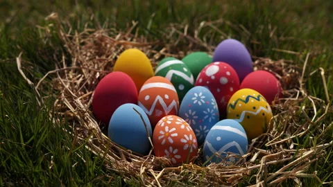 Happy Easter Day. Easter eggs on green grass background, Dolly shot. Stock Footage 148988935