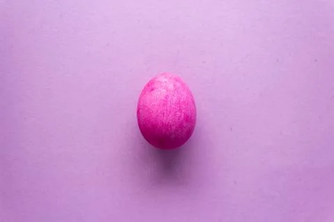 Happy Easter Day With Pink Egg On a Pink Background Stock Photos