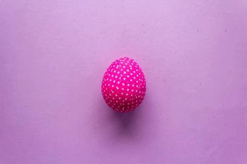 Happy Easter Day With Pink Egg On a Pink Background Stock Photos