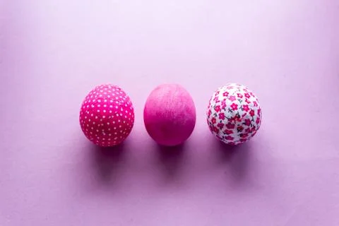 Happy Easter Day With Pink Eggs On a Pink Background Stock Photos