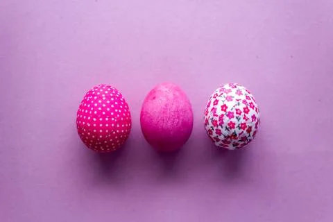 Happy Easter Day With Pink Eggs On a Pink Background Stock Photos