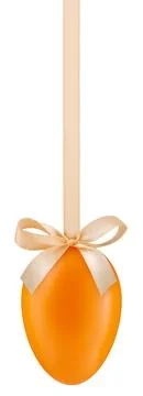 Happy Easter decoration egg with shiny ribbon bow in pastel light orange co.. Stock Photos