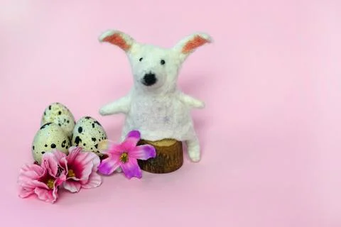 Happy Easter. DIY bunny, eggs and flowers on pink background. Easter card i.. 写真素材