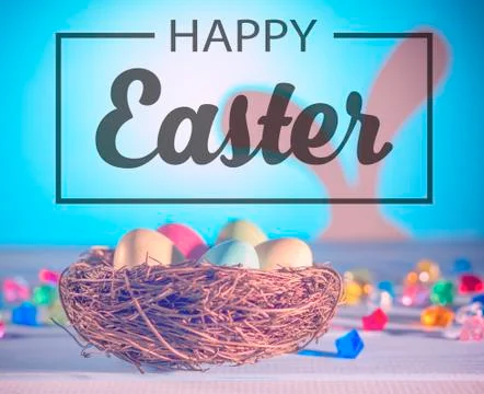 Happy Easter. The Easter Bunny, a nest with eggs. Color picture, Easter eggs. 스톡 사진