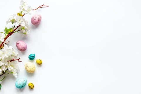 Happy Easter with eggs and flowering branch, top view Stock Photos