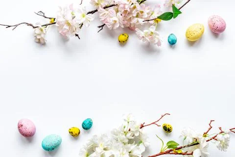 Happy Easter with eggs and flowering branch, top view Stock Photos
