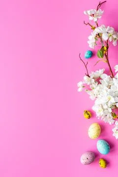 Happy Easter with eggs and flowering branch, top view Stock Photos