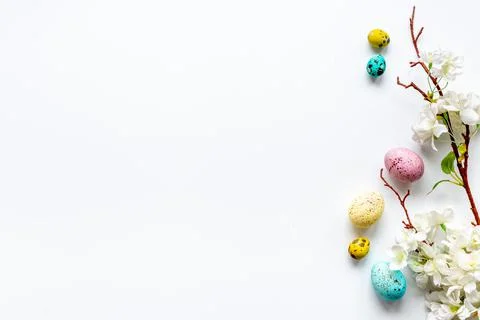 Happy Easter with eggs and flowering branch, top view Stock Photos