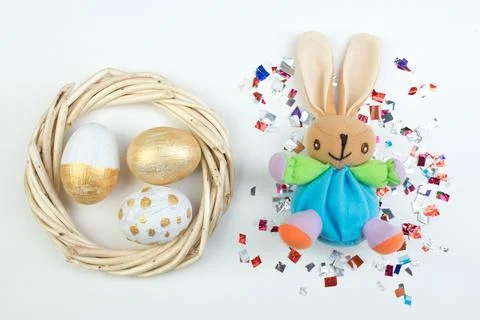 Happy Easter. eggs and rabbit on white background.. Balls, wreath woven fro.. Stock Photos