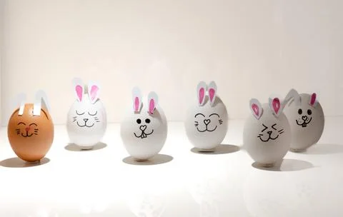 Happy Easter Eggs with Bunny Ears and Faces Stock Photos