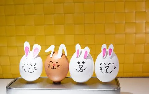 Happy Easter Eggs with Bunny Ears and Faces Stock Photos