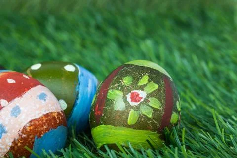 Happy easter eggs festival event on grass,can use as background. Photos