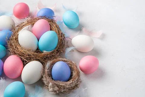 Happy Easter, festive background with Easter eggs on a gray background. Stock Photos