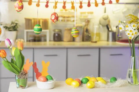 Happy Easter. Festive decorated interior in kitchen in the house, for holiday Stock Photos