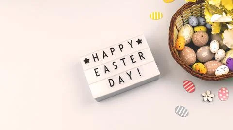 Happy Easter flat lay background with text, easter eggs, banner on white back Stock Photos