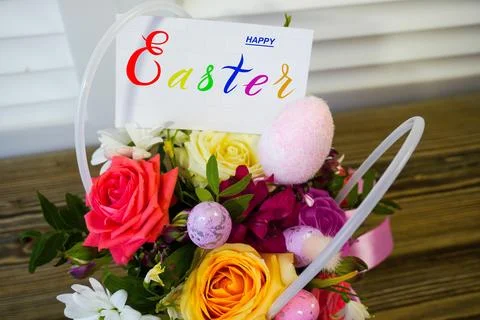 Happy easter! Flat Lay, Internet banner, postcard on Easter.  Bouquet of flow Stock Photos