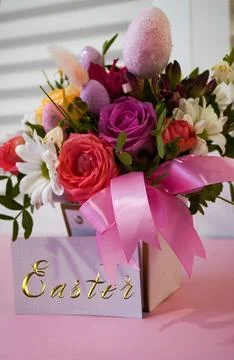 Happy easter! Flat Lay, Internet banner, postcard on Easter.  Bouquet of flow Stock Photos
