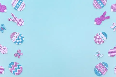 Happy Easter frame on blue with copy space. Stock Photos