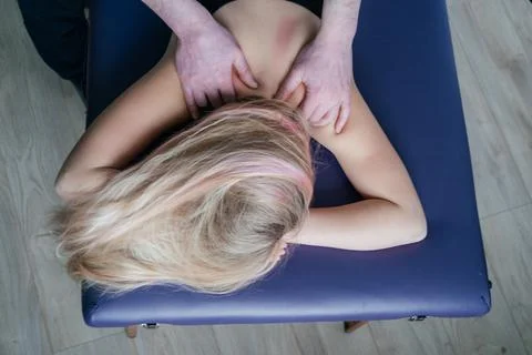 Happy Easter greeting card with Easter wreath, dyed eggs and spring flowers Stock Photos