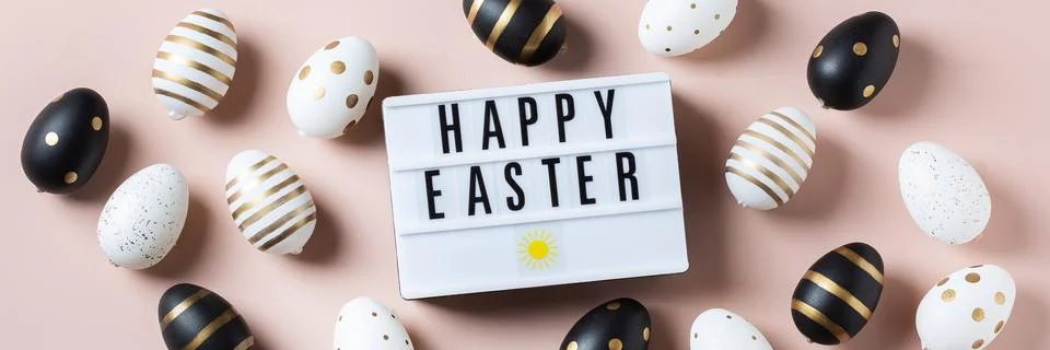 Happy Easter greeting card with eggs on pink background, banner Stock Photos