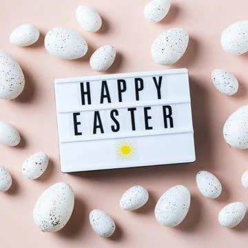 Happy Easter greeting card with eggs on pink background Stock Photos