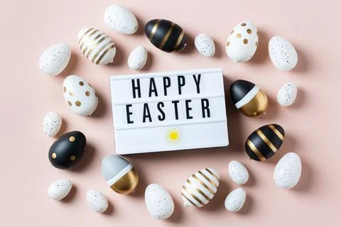 Happy Easter greeting card with eggs on pink background Stock Photos