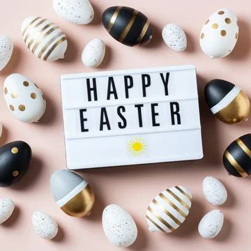 Happy Easter greeting card with eggs on pink background Stock Photos