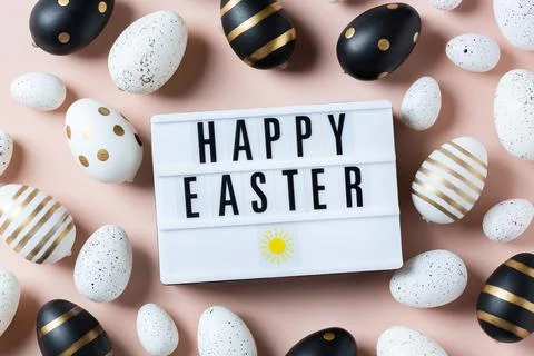 Happy Easter greeting card with eggs on pink background Stock Photos