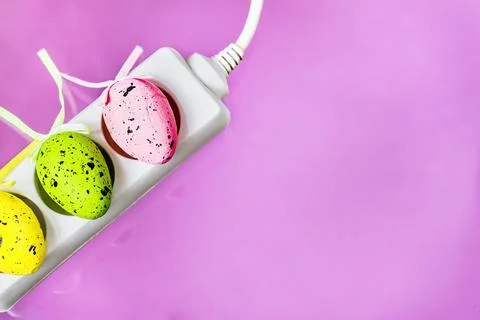 Happy Easter greeting card with electrical switch on pink background Stock Photos