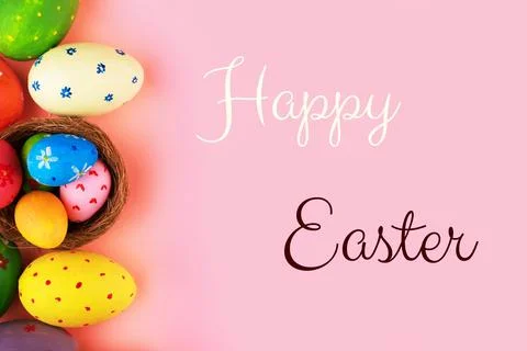 Happy Easter greeting card featuring colorful hand-painted eggs in a nest a.. Stock Photos
