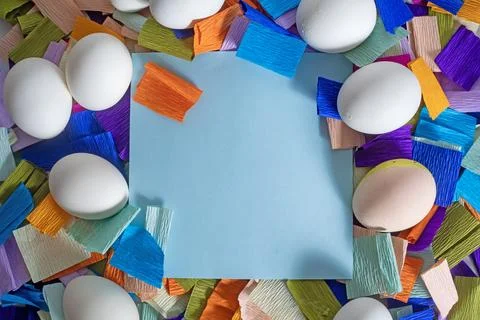 Happy Easter Greeting Card. White eggs with a multi-colored crepe paper bac.. Stock Photos