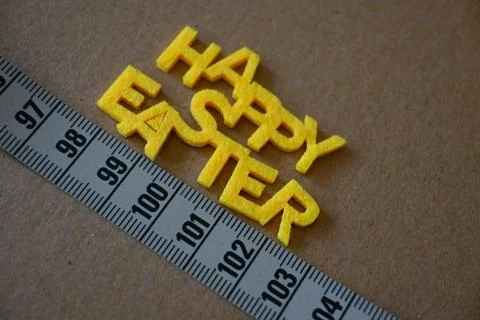 Happy Easter greeting text with measuring tape Stock Photos