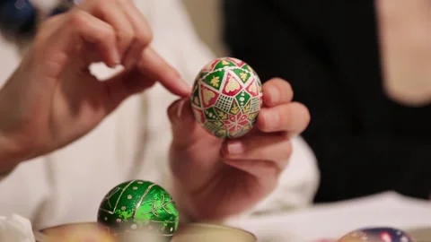 Happy Easter Holiday. Close-up hands paint and decorate eggs Stock Footage 170125791