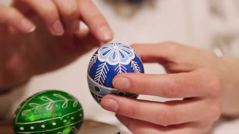 Happy Easter Holiday. Close-up hands paint and decorate eggs Stock Footage 170125792