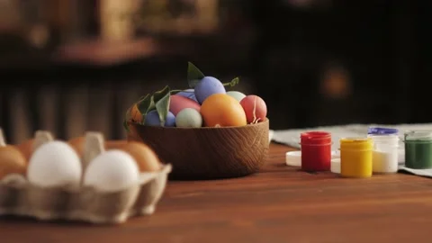 Happy Easter holiday. Coloring eggs close-up. Woman preparing for Easter Stock Footage 183504969