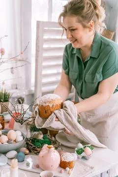 Happy easter holiday time in spring season. beautiful young housewife woman h Stock Photos