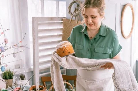 Happy easter holiday time in spring season. beautiful young housewife woman h Stock Photos