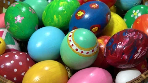 Happy Easter. Homemade painted eggs in a basket Close up of a decorative ne.. Stock Footage 231688282