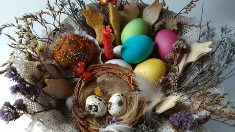 Happy Easter igniting red candle in a basket Stock Footage 105098869