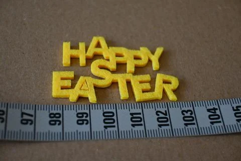 Happy Easter lettering with ruler Stock Photos