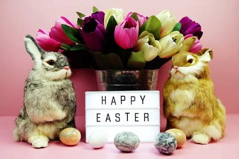 Happy Easter light box with easter element decoration on pink background Stock Photos
